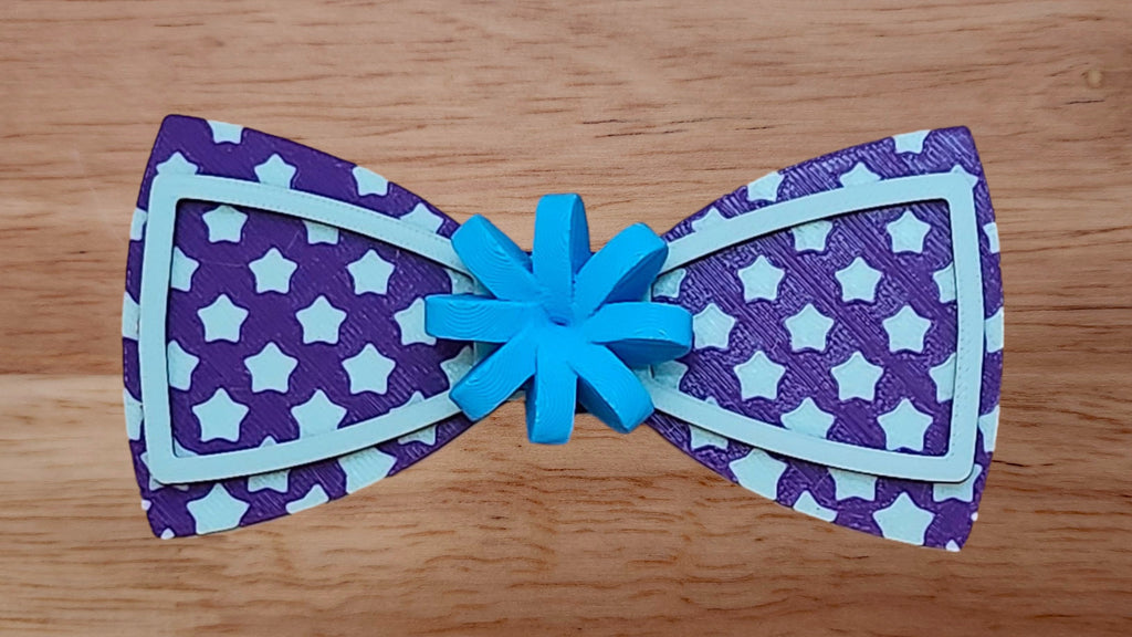 Gift Bow Base with Bow Tie Shaped Edge Brim Small and Diminishing Star Back
