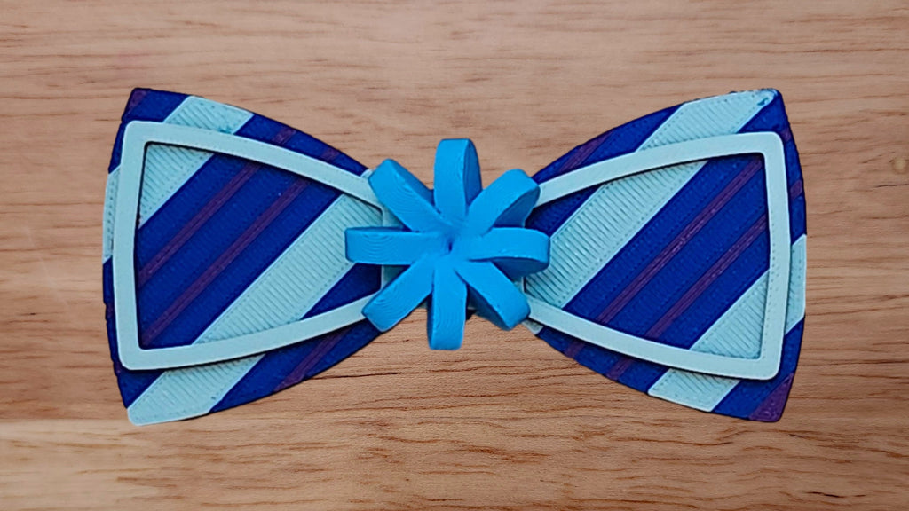 Gift Bow Base with Bow Tie Shaped Edge Brim Small and Wrapping Paper Back