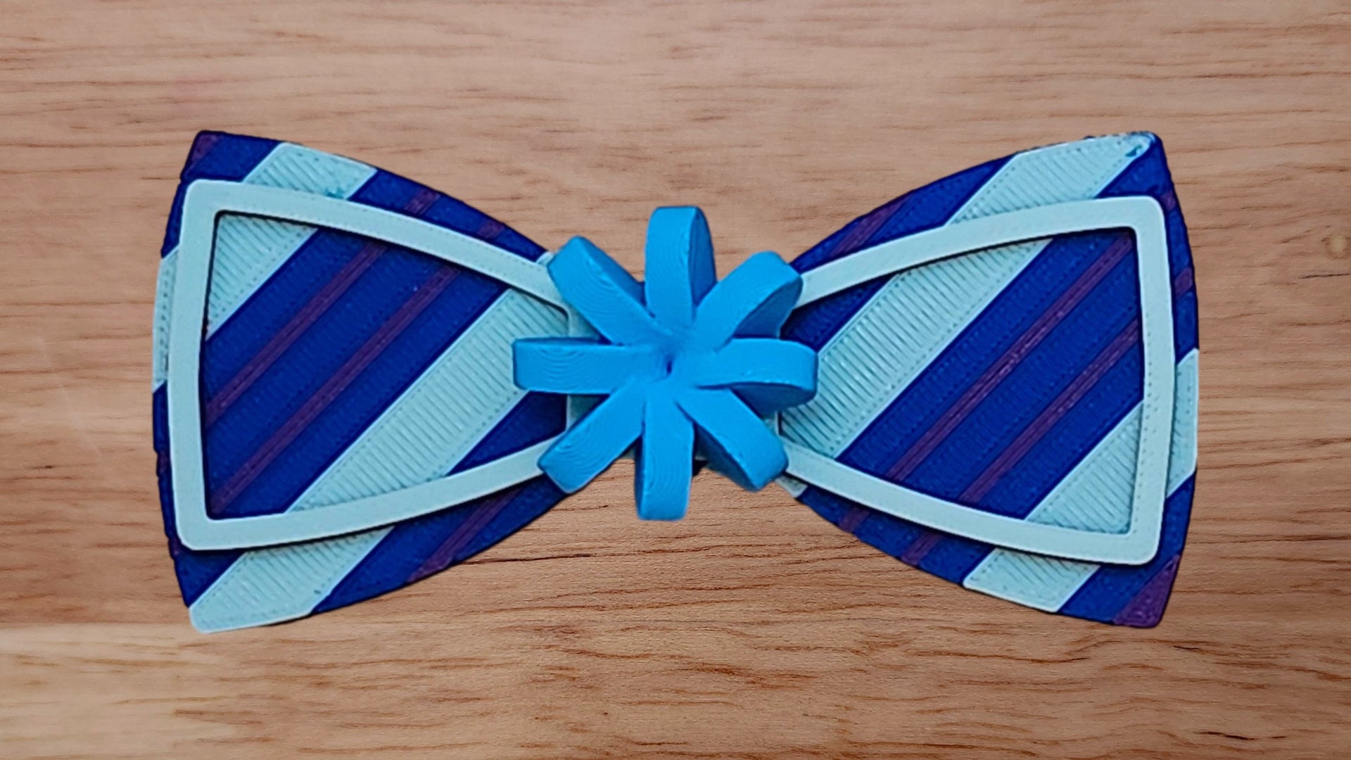 Gift Bow Base with Bow Tie Shaped Edge Brim Small and Wrapping Paper Back