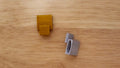 Two Necklace Adapters, one on it's side the other from the front