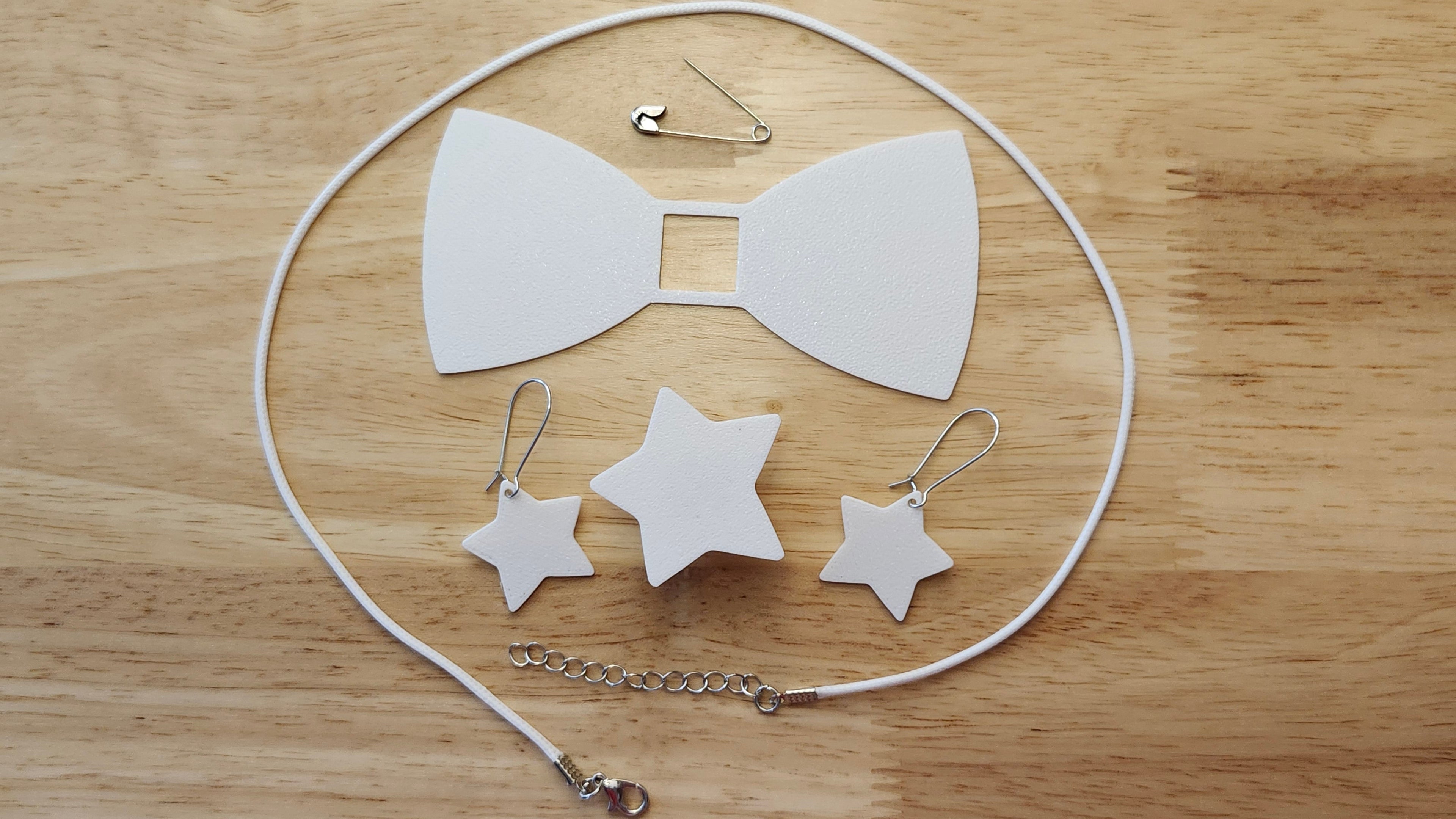 Bespoke It Yourself/Solid White Bow Bundle including Star Button Cover and Blank Bow, matching Star earrings, a safety pin and white necklace. 3D printed for use as a bow tie, button cover, necklace, pin, hat pin, lapel pin and so much more. 