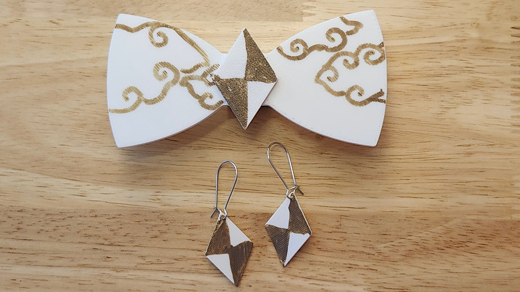 Bespoke It Yourself/Solid White Bow Bundle decorated sample including Diamond Button Cover and Blank Bow with matching Diamond earrings. 3D printed then hand colored by the customer for use as a bow tie, button cover, necklace, pin, hat pin, lapel pin and so much more.