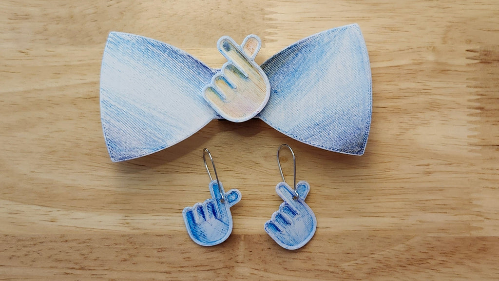 Bespoke It Yourself/Solid White Bow Bundle decorated sample including K-pop/Hand Heart Button Cover and Blank Bow with matching K-pop/Hand Heartt earrings. 3D printed then hand colored by the customer for use as a bow tie, button cover, necklace, pin, hat pin, lapel pin and so much more.