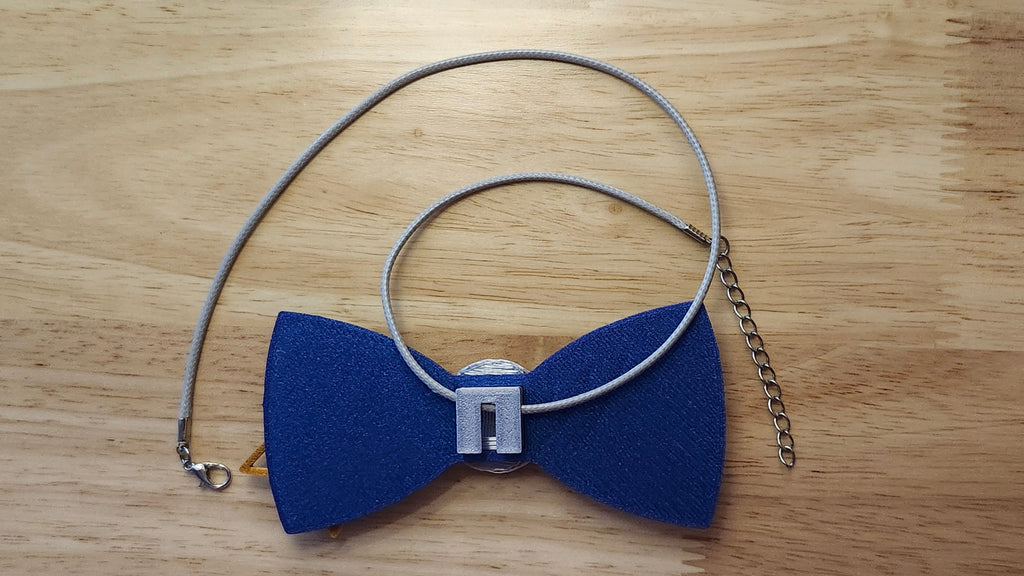 Starry Night Bow Bundle including Moon Button Cover, Diminishing  Stars Bow and Shooting Star Back reverse side shown to demonstrate how it is worn with the included necklace. 3D printed for use as a bow tie, button cover, necklace, pin, hat pin, lapel pin and so much more.