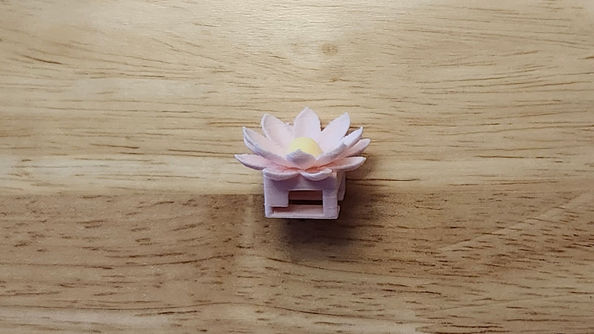 Lotus Button Cover 3D printed for use as a bow tie, button cover, necklace, pin, hat pin, lapel pin and so much more.