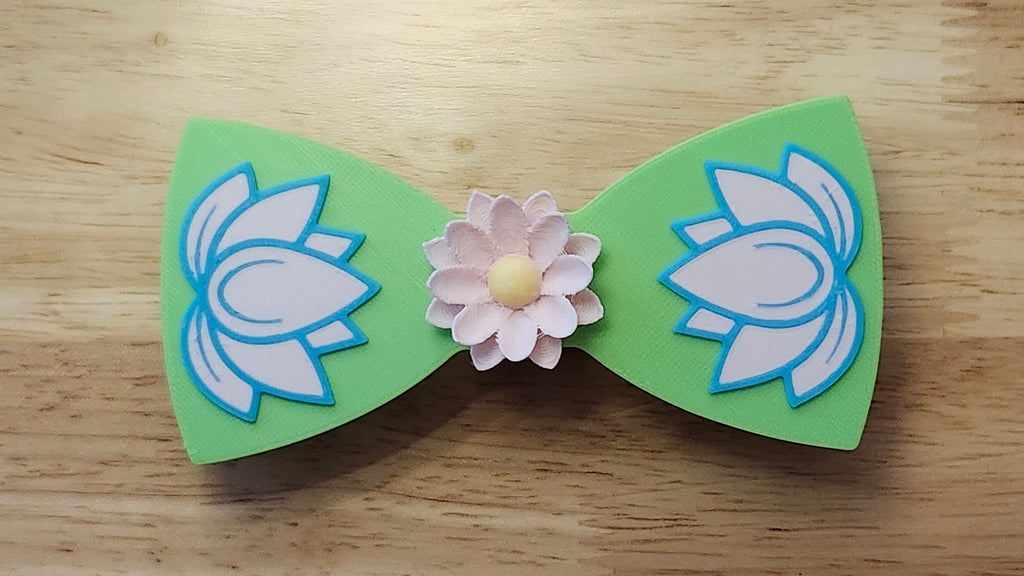 Lotus Flower Button Cover with Lotus Bow. 3D printed for use as a bow tie, button cover, necklace, pin, hat pin, lapel pin and so much more. 