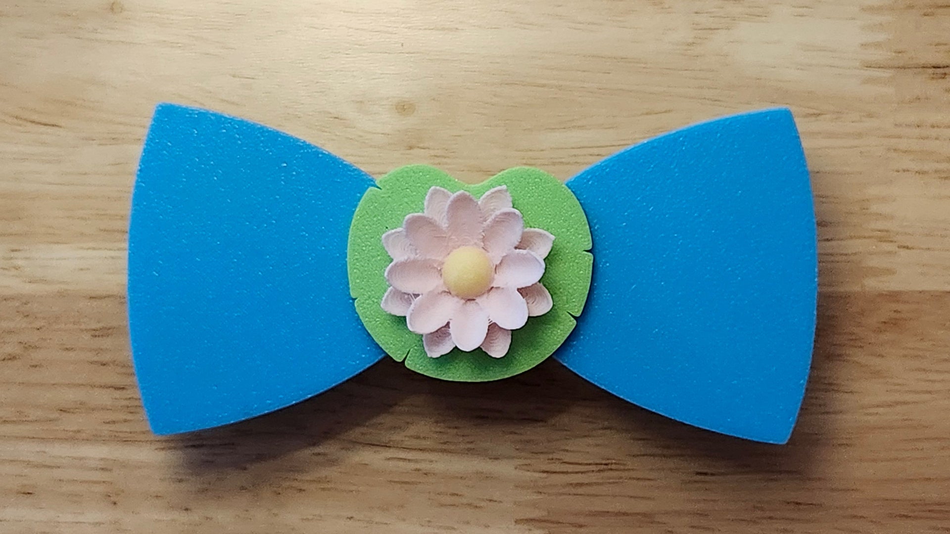 Lotus Flower Button Cover with Lily Pad Bow (reverse side), and Lily Pad Back. 3D printed for use as a bow tie, button cover, necklace, pin, hat pin, lapel pin and so much more. 