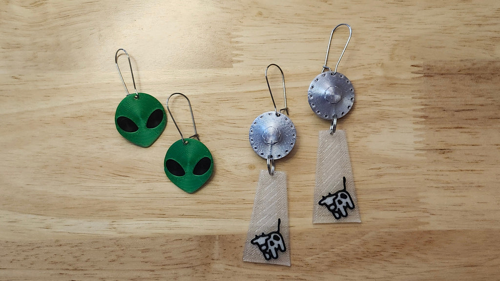 UFO Beaming Up Cow and Alien Head 3D printed earrings 