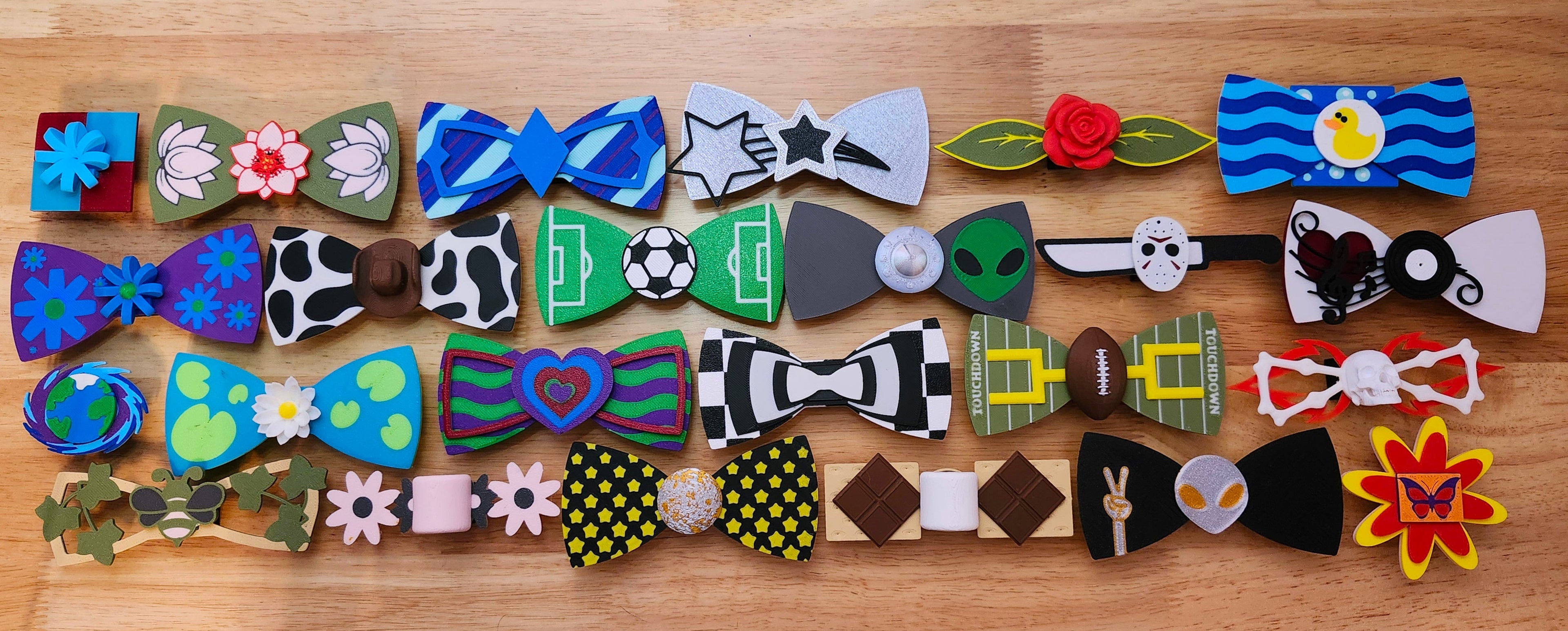 Collection of colorful bow ties on a wooden surface